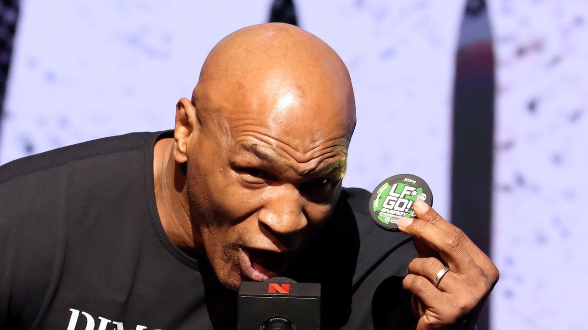 New York , United States - 13 May 2024; Mike Tyson, holding an LF*GO caffeine energy pouch, during a pre-fight press conference held at the Apollo Theatre in New York, USA, in advance of Jake Paul and Mike Tyson's heavyweight bout and the rematch between Katie Taylor and Amanda Serrano for the undisputed super lightweight championship titles on July 20 at AT&T Stadium in Arlington, Texas. (Photo By Ed Mulholland / Sportsfile via Getty Images)