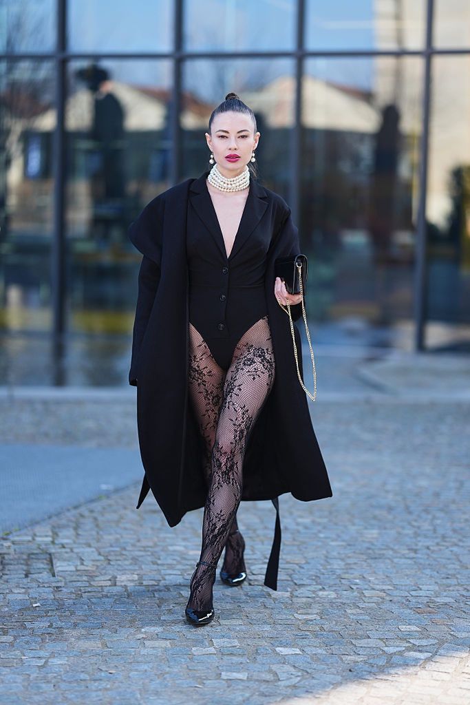 Zdjęcie przed butikem Prada, podczas Tygodnia Mody w Mediolanie