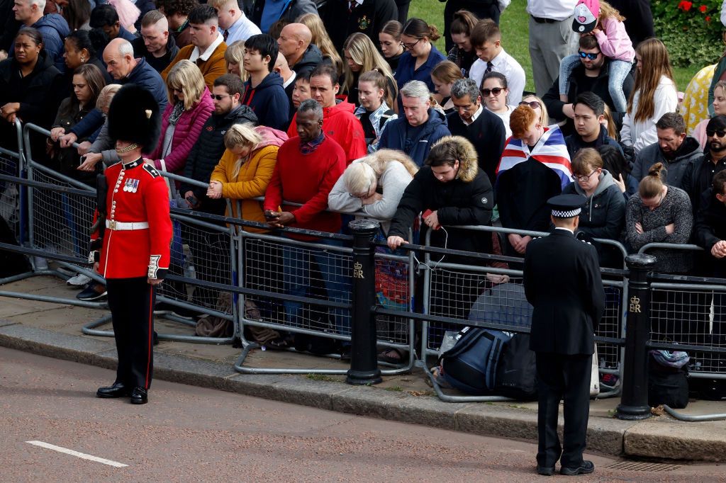 The State Funeral Of Queen Elizabeth IILONDON, ENGLAND - SEPTEMBER 19: Mourners ahead of The State funeral of Queen Elizabeth II on September 19, 2022 in Windsor, England. The committal service at St George's Chapel, Windsor Castle, took place following the state funeral at Westminster Abbey. A priviate burial in The King George VI Memorial Chapel followed. Queen Elizabeth II died at Balmoral Castle in Scotland on September 8, 2022, and is succeeded by her eldest son, King Charles III. (Photo by Chip Somodevilla/Getty Images)Chip Somodevilla