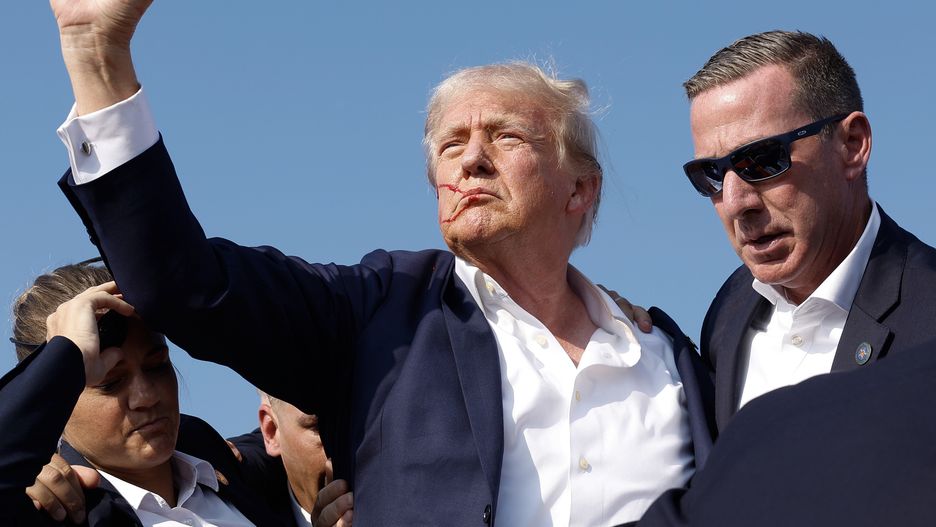 Donald Trump Injured During Shooting At Campaign Rally In Butler, PA
BUTLER, PENNSYLVANIA - JULY 13: Republican presidential candidate former President Donald Trump pumps his fist as he is rushed offstage during a rally on July 13, 2024 in Butler, Pennsylvania. Butler County district attorney Richard Goldinger said the shooter is dead after injuring former U.S. President Donald Trump, killing one audience member and injuring another in the shooting. (Photo by Anna Moneymaker/Getty Images)
Anna Moneymaker
bestof, topix