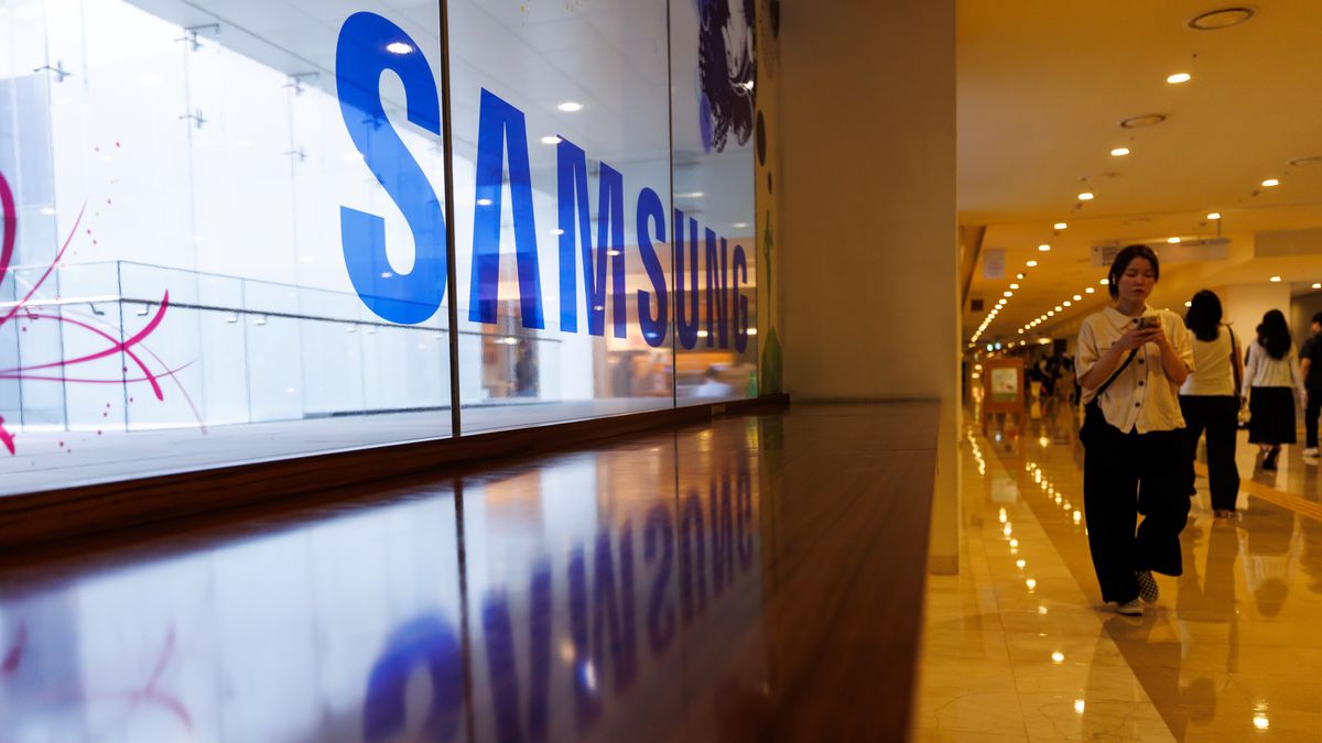 The Samsung Electronics Co. signage at the company's Seocho office building in Seoul, South Korea, on Monday, June 29, 2026. South Korean firms including Samsung and SK Hynix will spend at least 1,350 trillion won on chips and data centers as the country seeks to maintain its edge in the AI era. Photographer: SeongJoon Cho/Bloomberg via Getty Images