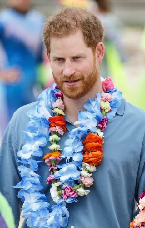 Meghan Markle w ciąży i książę Harry na plaży Bondi w Sydney