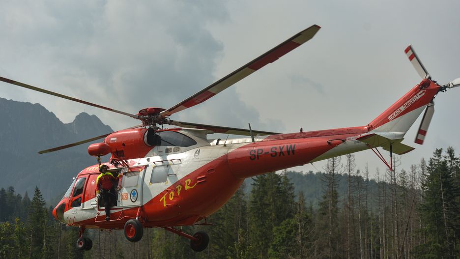 The Tatra Volunteer Search and Rescue (TOPR) helicopter returns to collect another team of rescuers to search missing people around Giewont mount (1,895 m) on the Polish side of the Tatra Mountains.On Thursday afternoon, a heavy storm went through the Tatra mountains leaving four people dead and over 140 injured. Tourists who were on and around the peak of Giewont mountain were exposed directly to a series of lightning strikes. Nine people are still missing.  On Friday, August 23, 2019, in Zakopane, Poland. (Photo by Artur Widak/NurPhoto via Getty Images)