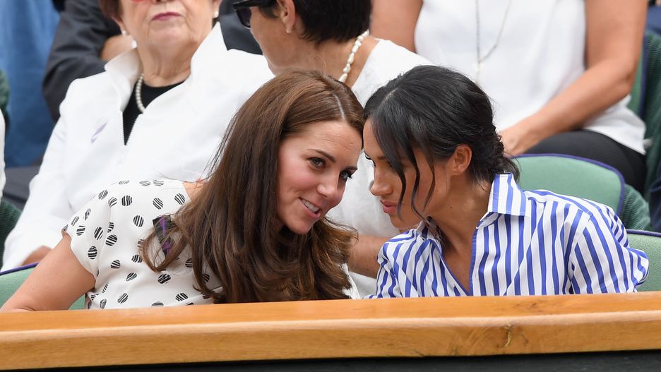 LONDON, ENGLAND - JULY 14: Catherine, Duchess of Cambridge and Meghan, Duchess of Sussex attends day twelve of the Wimbledon Tennis Championships at the All England Lawn Tennis and Croquet Club on July 13, 2018 in London, England. (Photo by Karwai Tang/WireImage )