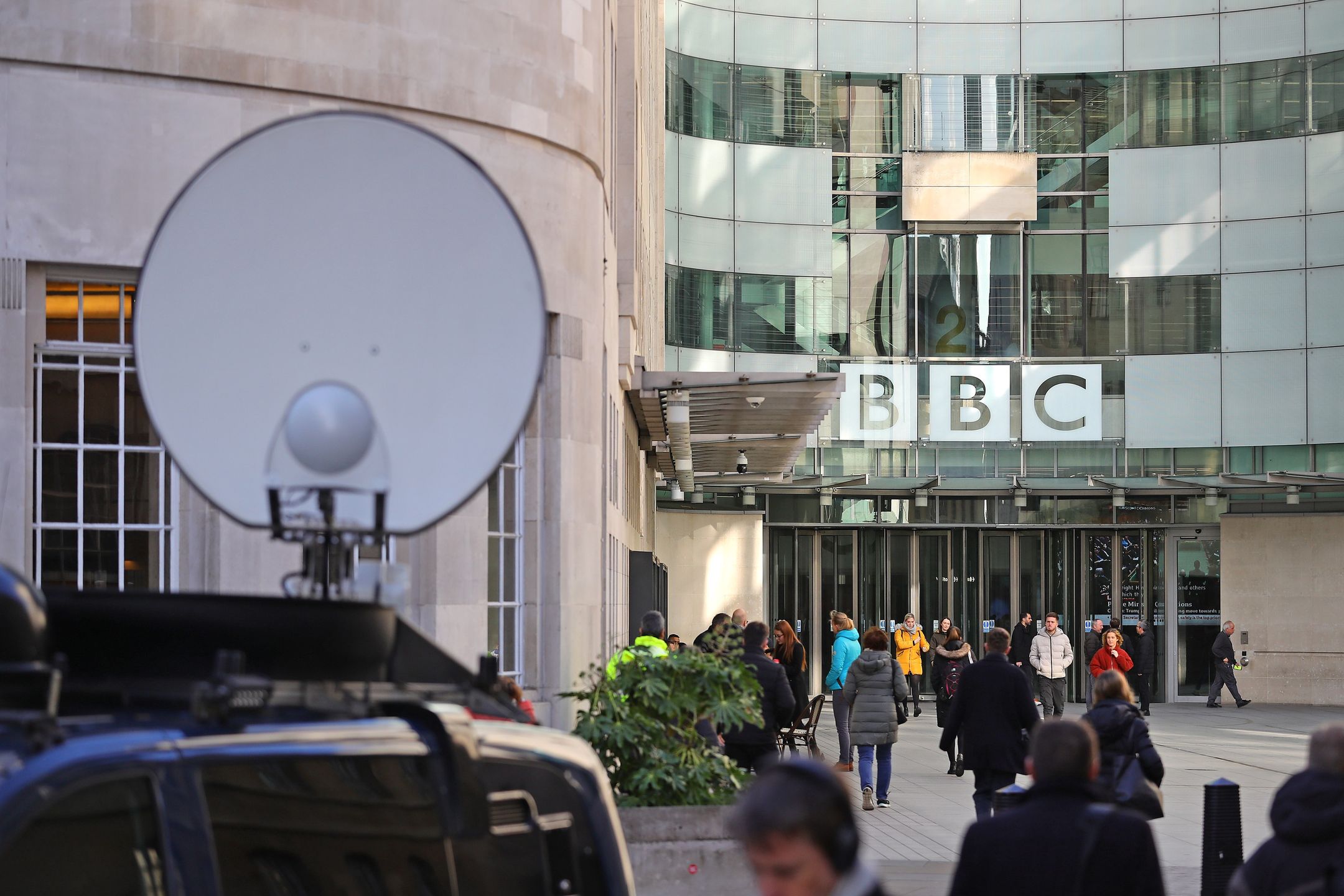 Media trucks outside BBC Broadcasting House in London, they are to announce cuts to its news division as part of a cost-cutting drive. (Photo by Aaron Chown/PA Images via Getty Images)