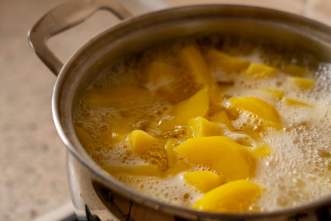 It only takes a moment of inattention for the water from the potatoes to spill onto the stove.