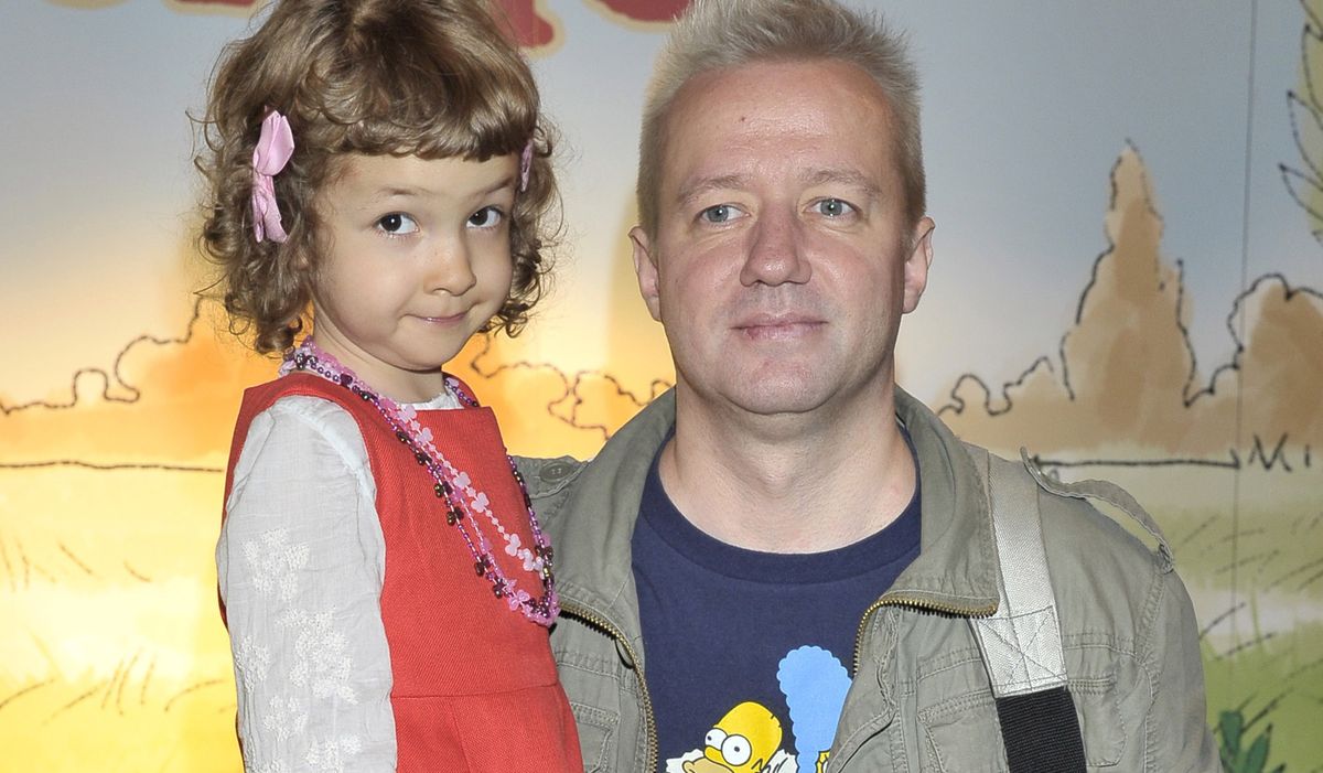 Robert Leszczyński z córką w 2011 r.