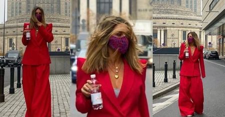 Małgorzata Rozenek włóczy szerokimi spodniami pod Pałacem Kultury, reklamując butelkę wody (ZDJĘCIA)