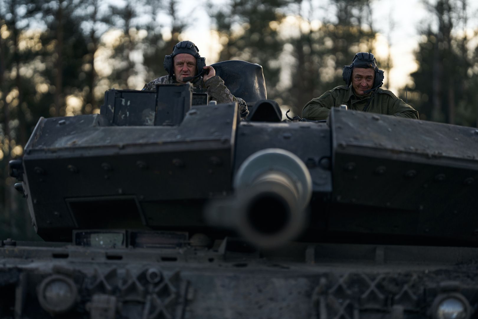 LYMAN REGION, UKRAINE - DECEMBER 26: Movement of tanks and inspection during crew rest on December 26, 2023 in Lyman Region, Kreminna Forest, Ukraine. On 2 July 2023 Ukraine had reportedly received 54 Leopard 2A4 from NATO-member countries. The Leopard 2A6 includes the addition of the Rheinmetall 120 mm L/55 smoothbore gun and other changes. All German tank battalions of the "crisis intervention forces" are equipped with the A6. Canada purchased twenty Leopard 2A6s from the Netherlands. These were delivered in 2007. Portugal purchased 37 Leopard 2A6s from the Dutch in 2007, with delivery in 2008. In January 2014, Finland purchased 100 L2A6s, as well as munitions, simulators, and a ten-year supply of reserve parts from the Netherlands. (Photo by Libkos/Getty Images)