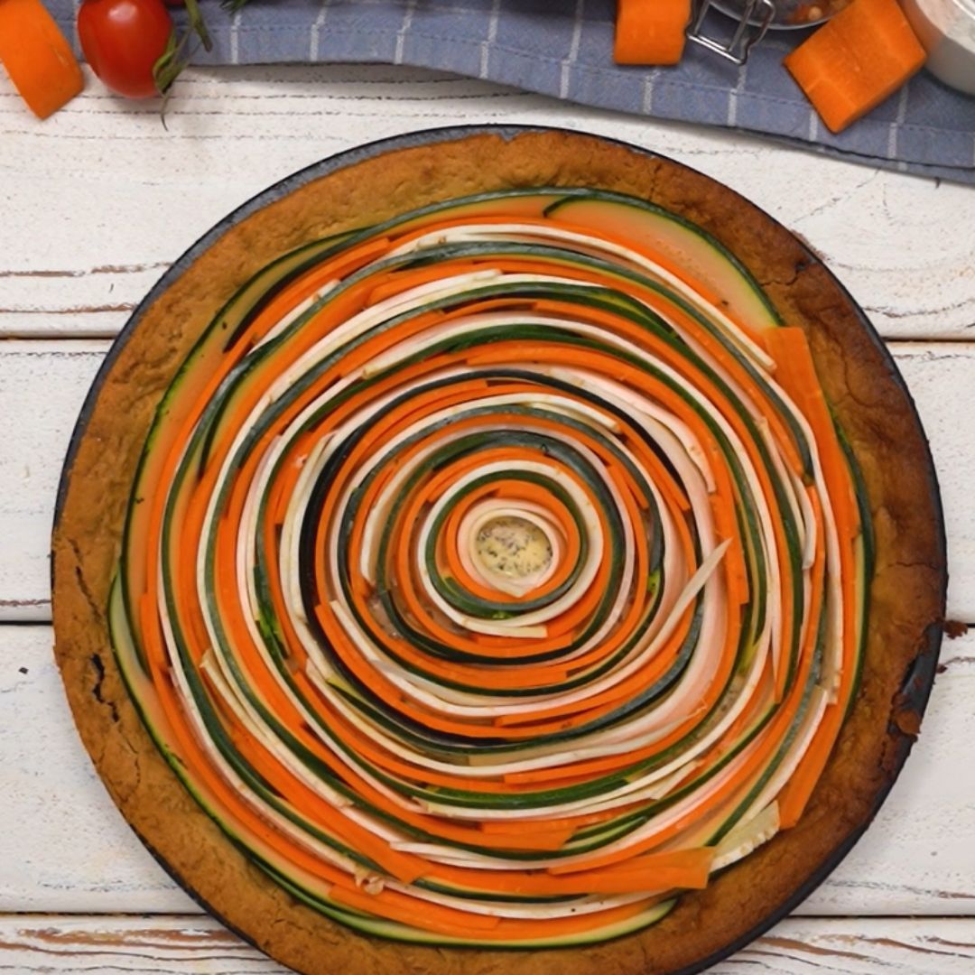 Filling the pastry with vegetable rounds is great fun.