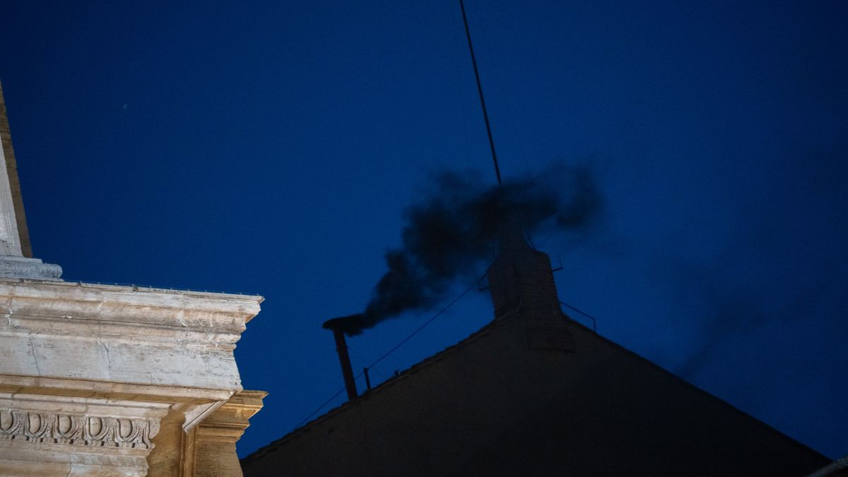 Black smoke emerges from the chimney atop the Sistine Chapel, signaling that a new Pope has not yet been elected by the Conclave at the Vatican on May 7, 2025. (Photo by Massimo Valicchia/NurPhoto via Getty Images)