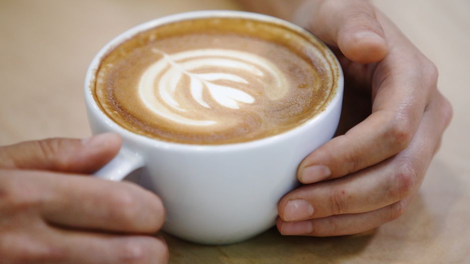 MOSCOW, RUSSIA - JULY 15, 2021: A cup of coffee in the Smart Coffee coffee space at the VDNKh exhibition center. Smart Coffee includes a coffee production facility, a coffee house, and a training center for baristas and coffee roasters. Coffee prime costs are expected to rise in the fall of 2021 as prices for arabica coffee beans at the commodities markets are hitting the five-year maximum. Artyom Geodakyan/TASS (Photo by Artyom Geodakyan\TASS via Getty Images)