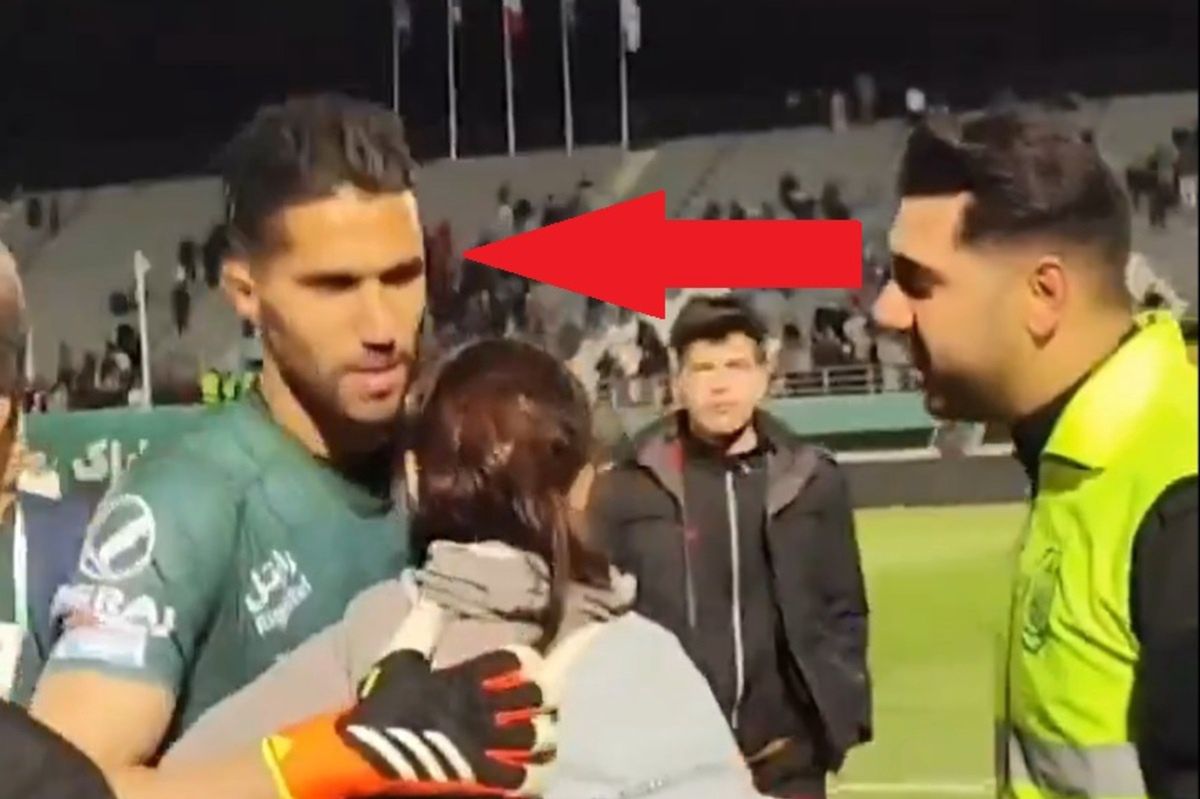Hossein Hosseini hugged a fan after the end of the match.
