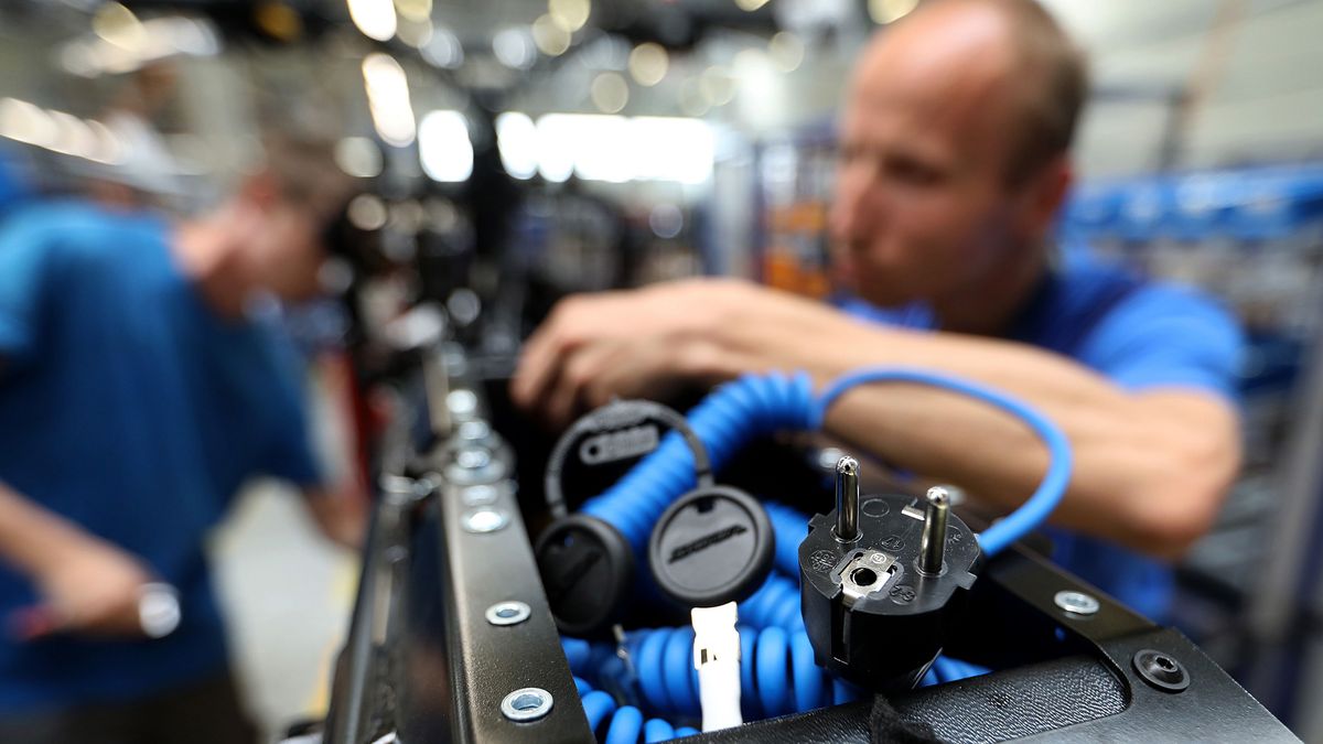 Reviving an Icon of East German Highways For The Electric Age
A Europlug 250 volt domestic AC power charging plug sits in the seat compartment of a Schwalbe electric scooter on the production line inside the Govecs AG factory in Wroclaw, Poland, on Tuesday, June 18, 2019. The original Schwalbe was made in the East German town of Suhl, 350 kilometers southwest of Berlin, but the factory site was contaminated from decades of weapons manufacturing. Photographer: Krisztian Bocsi/Bloomberg via Getty Images
Bloomberg
e.u., eu, worker, labor market, emea, work, laborer, employment, jobs, fabrication, evs - electric vehicles, polish, motorcycles, labor, labour, business news, manufactured goods, european, industries, automotive