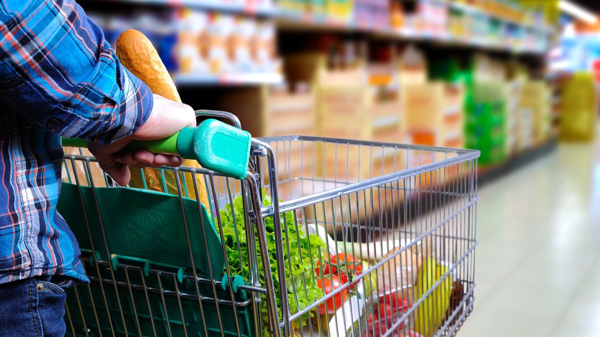 Man pushing shopping cart full of food in the supermarket aisle. Elevated rear view. horizontal compositionshopping, cart, supermarket, market, consumer, basket, pushing, push, man, hands, blue shirt, shopper, super, food, shelf, hypermarket, purchase, products, fill, green, metallic, store, shop, mall, consumerism, retailer, business, wagon, discount, price, sale, grocery, offers, women, buy, healthy, goods, economy, everyday, purchase, transport, commerce, lifestyle, horizontal, composition, elevated, rear, shopping, cart, supermarket, market, consumer, basket, pushing, push, man, hands, blue shirt, shopper, super, food, shelf, hypermarket, purchase, products, fill, green, metallic, store, shop, mall, consumerism, retailer, business, wagon, discount, price, sale, grocery, offers, women, buy, healthy, goods, economy, everyday, transport, commerce, lifestyle, horizontal, composition, elevated, rear