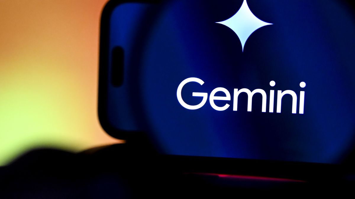 ANKARA, TURKIYE - FEBRUARY 3: In this photo illustration, the Gemini logo is displayed on a mobile phone through a magnifying glass in Ankara, Turkiye, on February 3, 2026. (Photo by Arda Kucukkaya/Anadolu via Getty Images)