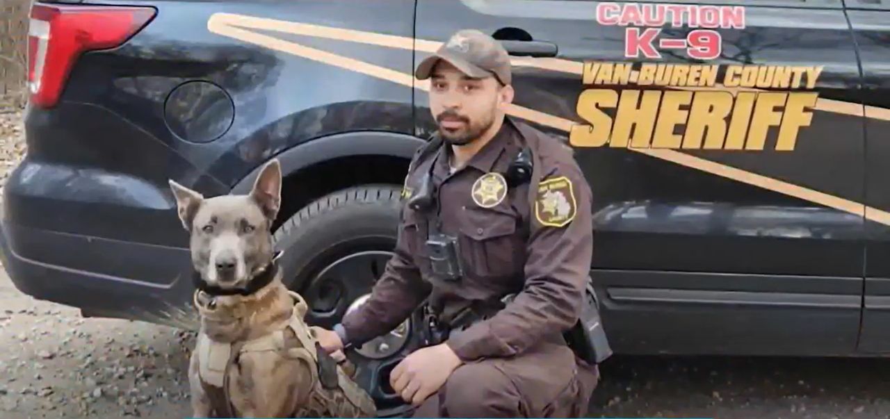 Police dog Kuno and police officer who found the 3-year-old boy