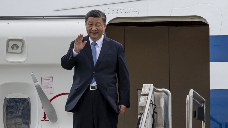 Xi Jinping, China's president, arrives at San Francisco International Airport (SFO) on the sidelines of the Asia-Pacific Economic Cooperation (APEC) summit in San Francisco, California, US, on Tuesday, Nov. 14, 2023. Xi arrived in San Francisco for a high-stakes meeting with his American counterpart Joe Biden on Tuesday, as the Chinese leader's first trip to the US in six years drew crowds of protesters and supporters onto the city's heavily policed streets. Photographer: David Paul Morris/Bloomberg via Getty Images