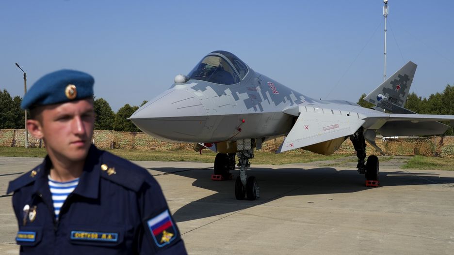 MOSCOW, RUSSIA - AUGUST 17: A soldier is seen in front of the a Sukhoi Su-57 aircraft during the International Military-Technical Forum "Army 2022" at Kubinka military training ground in Moscow, Russia on August 17, 2022. (Photo by Pavel Pavlov/Anadolu Agency via Getty Images)