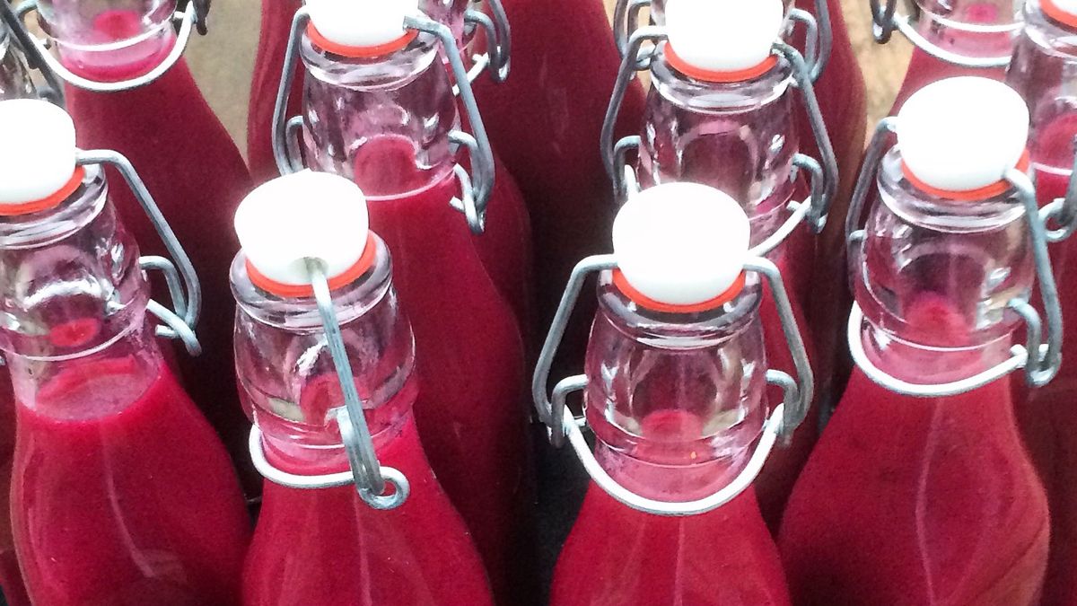 Bottles of beetroot, ginger and acai berry juice drinkrasmusbredahlsquare, outdoors, day, no people, still life, close-up, side view, bottles, large group of objects, abundance, drink, beverage, refreshment, healthy eating, freshness, ready to eat, beetroot, ginger, acai berries, juice, juicing, raw food, organic, vegetables, vegetarian, fruit, superfoods, tray