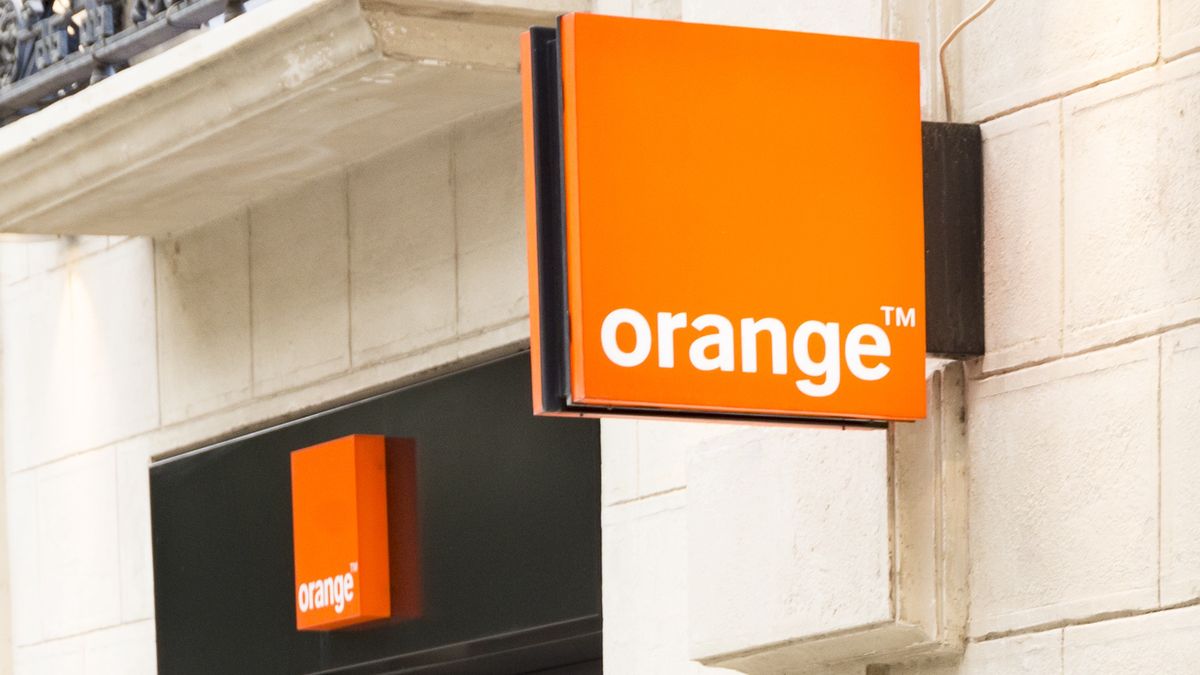 VALENCIA, SPAIN - 2021/09/24: A woman walks past an Orange mobile store in Valencia. (Photo by Xisco Navarro/SOPA Images/LightRocket via Getty Images)