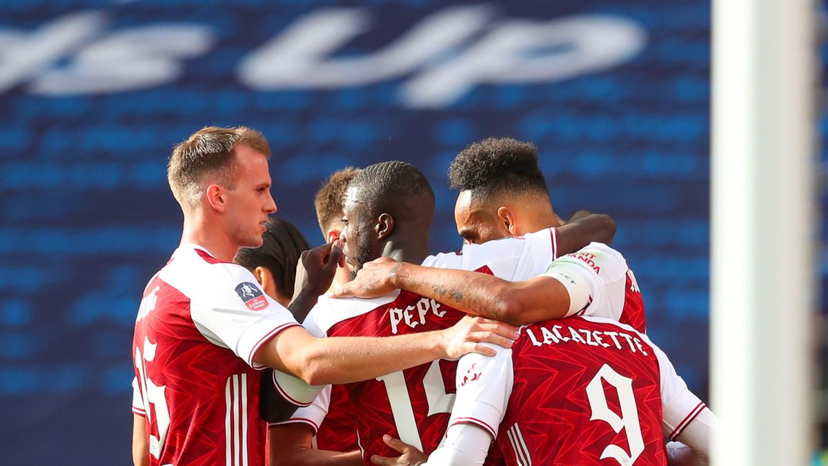 PAP/EPA / Cath Ivill / Na zdjęciu: piłkarze Arsenal FC