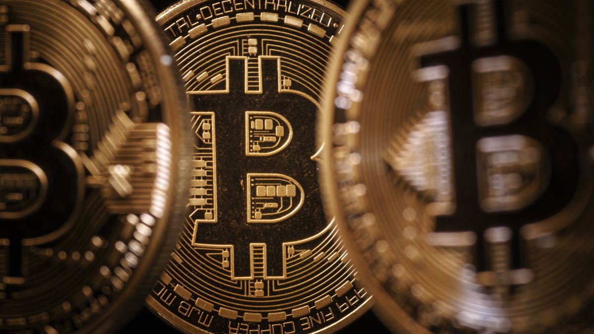 BERLIN, GERMANY - AUGUST 15: Symbolic photo on the topic of Bitcoin. Coins with the Bitcoin logo stand on a table on August 15, 2025 in Berlin, Germany. (Photo Illustration by Thomas Trutschel/Photothek via Getty Images)