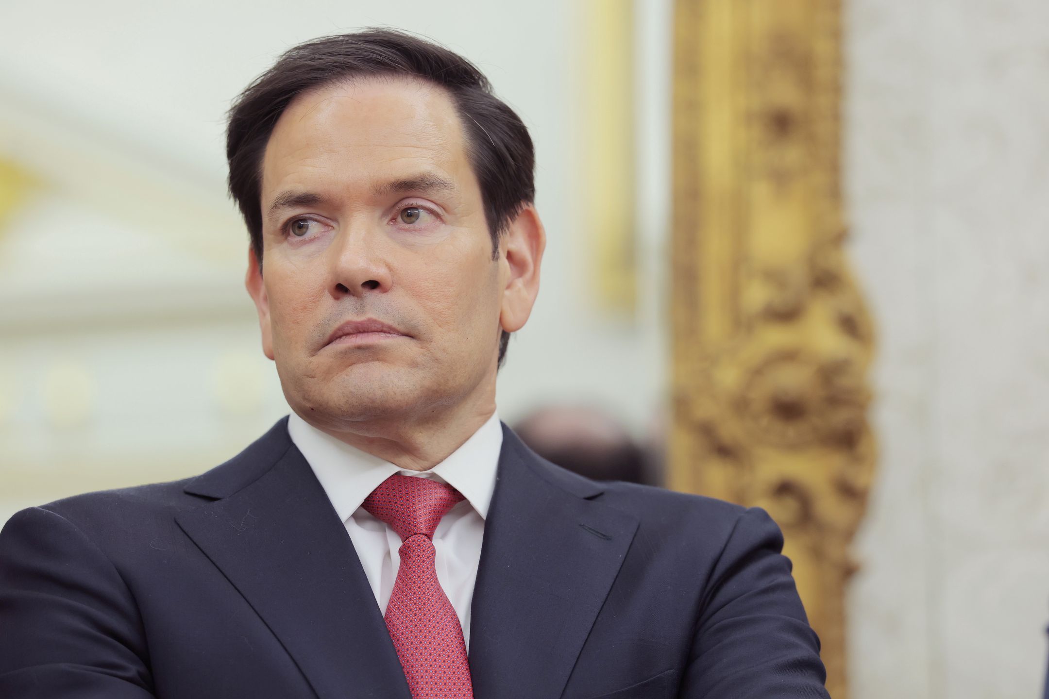 WASHINGTON, DC - MAY 06: U.S. Secretary of State Marco Rubio listens as U.S. President Donald Trump speaks during a swearing-in ceremony for Special Envoy to the Middle East Steve Witkoff in the Oval Office at the White House on May 06, 2025 in Washington, DC. U.S. President Donald Trump provided an update on the Houthi conflict in the Middle East. (Photo by Anna Moneymaker/Getty Images)