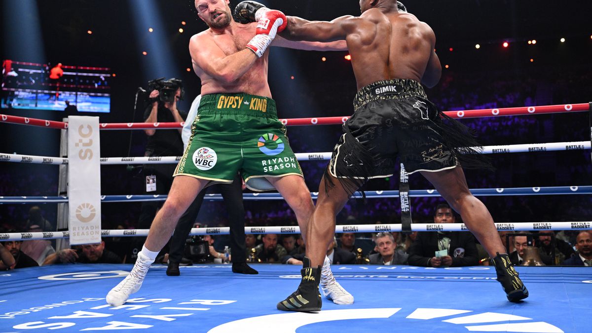 RIYADH, SAUDI ARABIA - OCTOBER 28: Tyson Fury punches Francis Ngannou during the Heavyweight fight between Tyson Fury and Francis Ngannou at Boulevard Hall on October 28, 2023 in Riyadh, Saudi Arabia. (Photo by Justin Setterfield/Getty Images)
