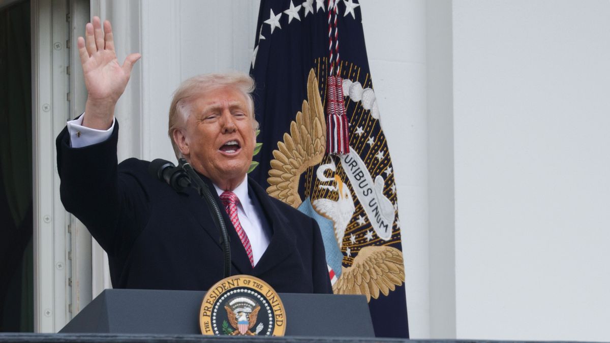 WASHINGTON, DC - MARCH 27: U.S. President Donald Trump waves as he departs after speaking from the Truman balcony during an event with farmers on the South Lawn of the White House on March 27, 2026 in Washington, DC. President Trump is expected to announce actions to support farmers who have been impacted by ongoing trade tariffs and the current war in the Middle East. (Photo by Alex Wong/Getty Images)