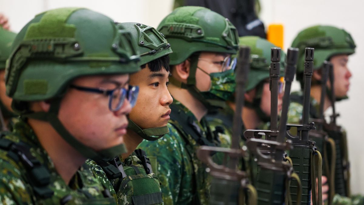 MIAOLI, TAIWAN - JULY 09: Taiwanese reservists partake in a pre-combat exercise held at a primary school, as the Han Kuang military exercise commences, in Miaoli, Taiwan, on July 09, 2025. Dubbed the biggest-ever version of its kind, the exercise, with a focus on 'Urban Resilience', will run day and night from July 09 through July 18. A huge number of regular personnel, advanced weapons acquired from the United States including the HIMARS missile systems and the M1A2T tanks, as well as 22,000 reservists are to be deployed. This comes as Taipei is bracing for a possible invasion by Beijing, after China stepped up activities of the People's Liberation Army around the self-governing island, with Chinese President Xi Jinping vowing not to give up the option to invade the island by force. (Photo by Daniel Ceng/Anadolu via Getty Images)