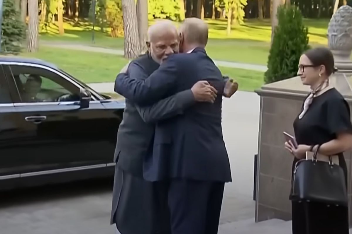 A greeting between Vladimir Putin and Prime Minister Narendra Modi.