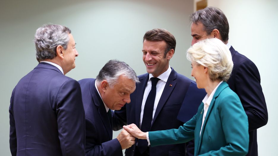 BRUSSELS, BELGIUM - OCTOBER 21: Prime Minister of Italy Mario Draghi (L), Hungarian Prime Minister Viktor Orban (2nd L) French President Emmanuel Macron (3rd R), Greek Prime Minister Kyriakos Mitsotakis (R) and President of the European Commission Ursula von der Leyen (2nd R) attend day two of the European Union (EU) leaders summit at the European Council headquarters in Brussels, Belgium, on October 21, 2022. The European Union agreed to press ahead with a set of emergency actions to address the blocs energy crisis, with Germany yielding to pressure from other member states to pave the way for a temporary price cap on natural gas. (Photo by Dursun Aydemir/Anadolu Agency via Getty Images)