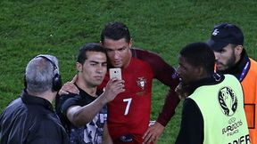 Euro 2016: kibic wbiegł na boisko, żeby zrobić sobie zdjęcie z Ronaldo (galeria)