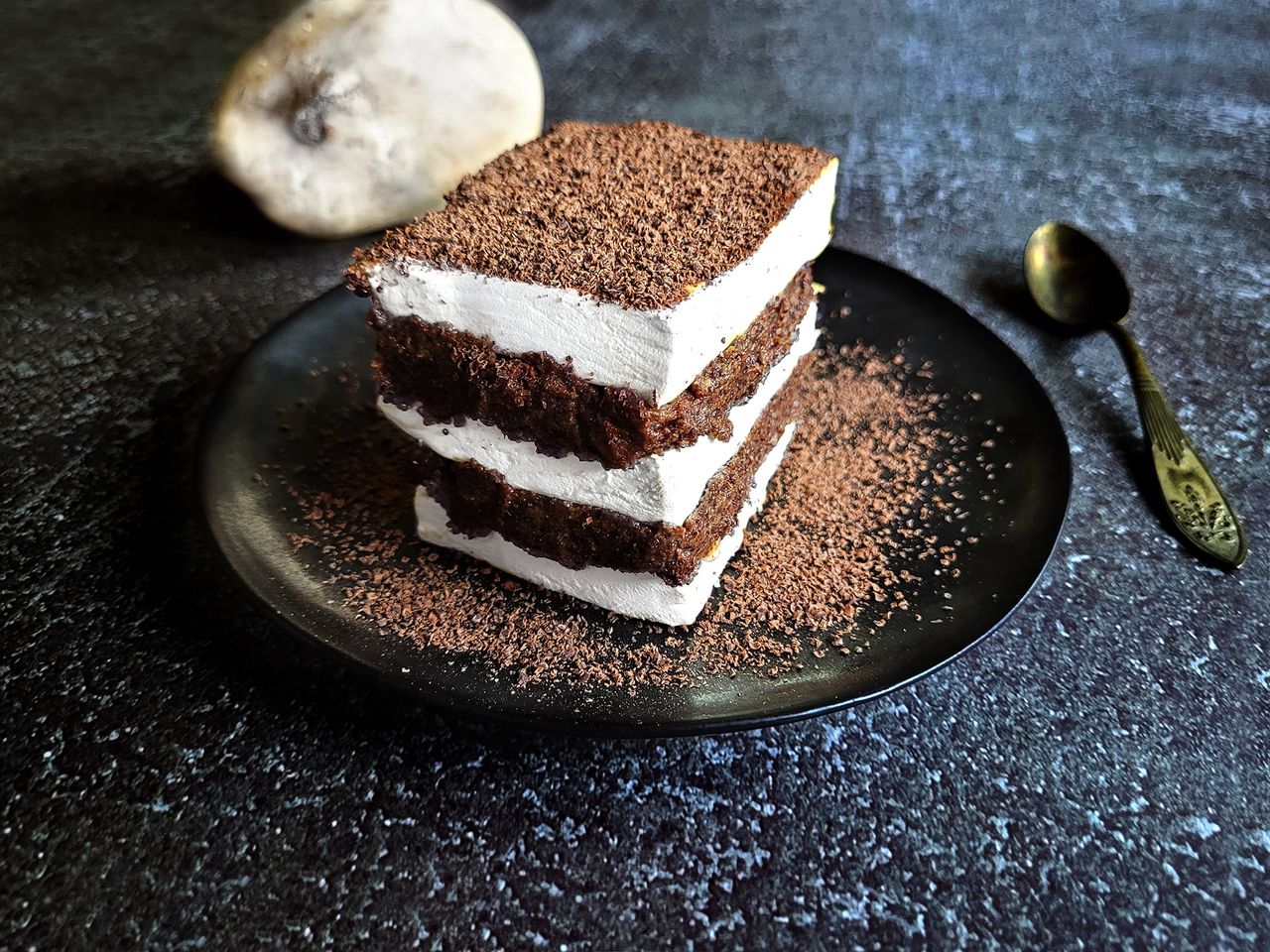 Poppy seed cake with parasol mushroom