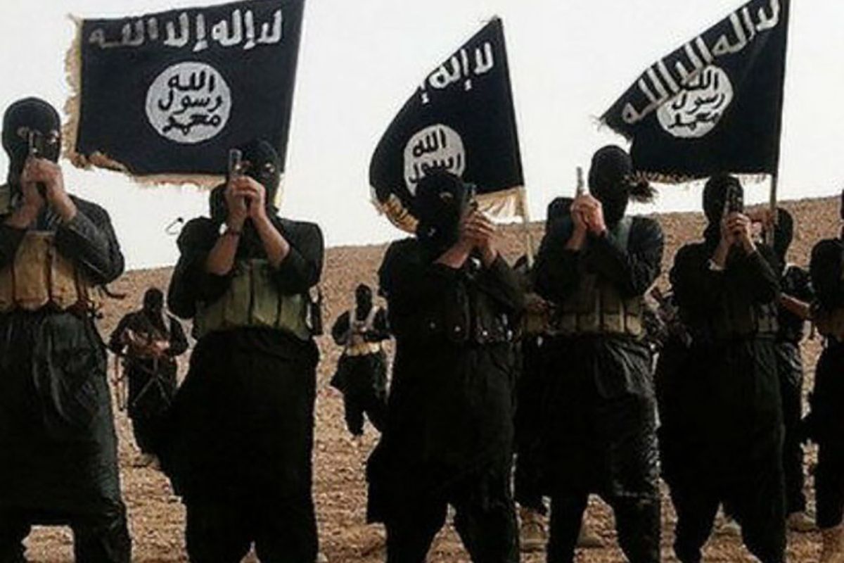Grupa ISIS ogłosiła śmierć przywódcy. Na zdjęciu oddział terrorystów tzw. Państwa Islamskiego