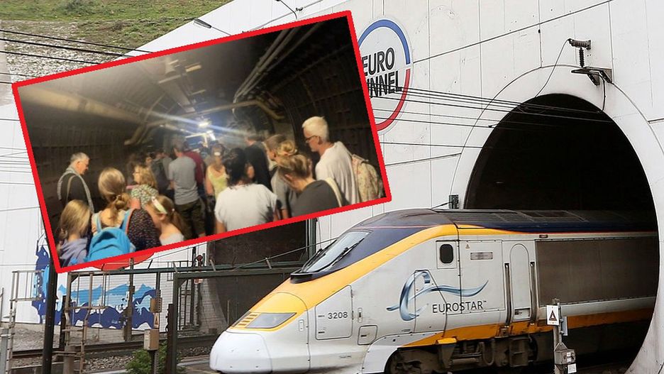 Pociąg Eurostar i ludzie czekający w tunelu pod kanałem La Manche na pociąg zastępczy