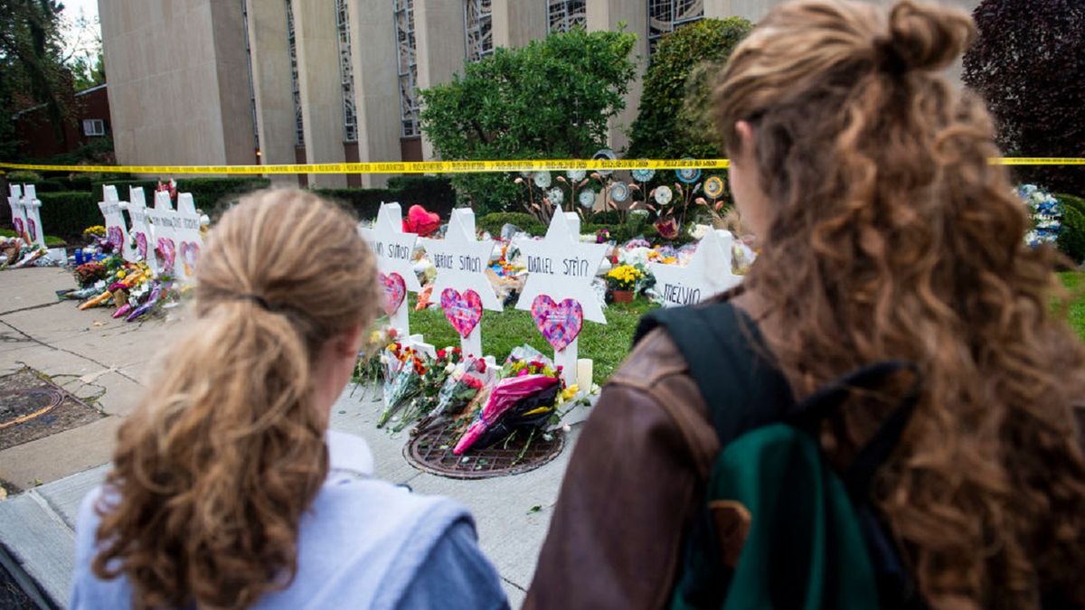 Members of Pittsburgh and the Squirrel Hill community pay
TREE OF LIFE SYNAGOGUE, PITTSBURGH, PENNSYLVANIA, UNITED STATES - 2018/10/29: Members of Pittsburgh and the Squirrel Hill community pay their respects at the memorial to the 11 victims of the Tree of Life Synagogue massacre perpetrated by suspect Robert Bowers on Saturday, October 27. (Photo by Matthew Hatcher/SOPA Images/LightRocket via Getty Images)
SOPA Images
mass shooting, crime, shooting, murder, anti semitism, tree of life, synagogue, USA, US, pennsylvania, pittsburgh, midwest, massacre, aftermath, vigil, memorial, flower, flowers, mourner, mourners