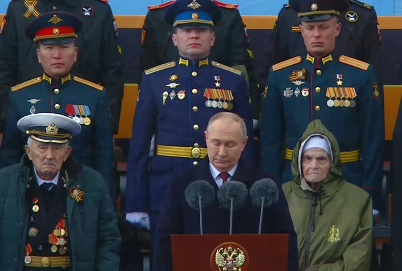 Putin, flanked by officers accused of war crimes at Victory Parade