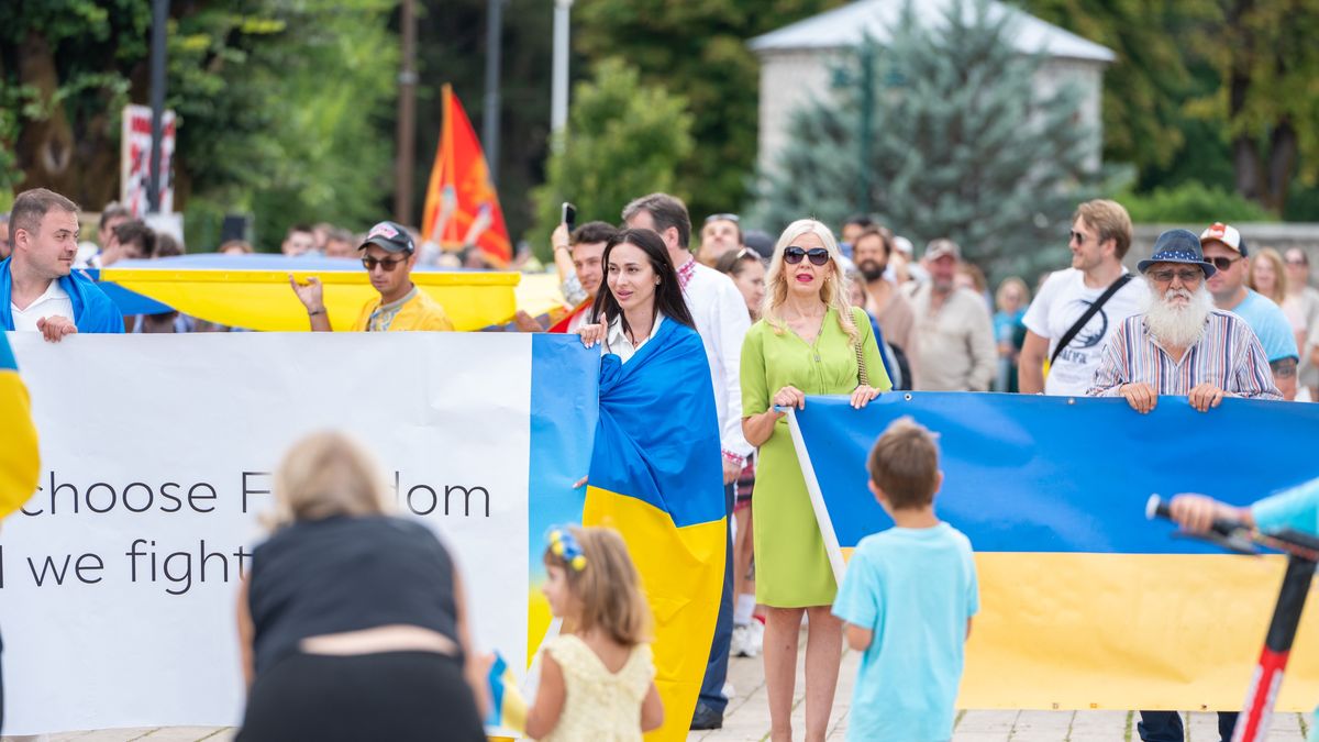 CETINJE, MONTENEGRO - AUGUST 24: Crowds march through the city streets carrying a 34-meter-long Ukrainian flag during a commemorative event on the occasion of Ukraine's 34th Independence Day in Cetinje, Montenegro, on August 24, 2025. The event was organized by the Ukrainian Union in Montenegro in cooperation with the Embassy of Ukraine in Podgorica. (Photo by Rusmin Radic/Anadolu via Getty Images)