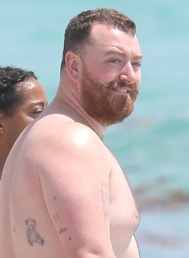 Sam Smith relaxes on the beach. Paparazzi photos