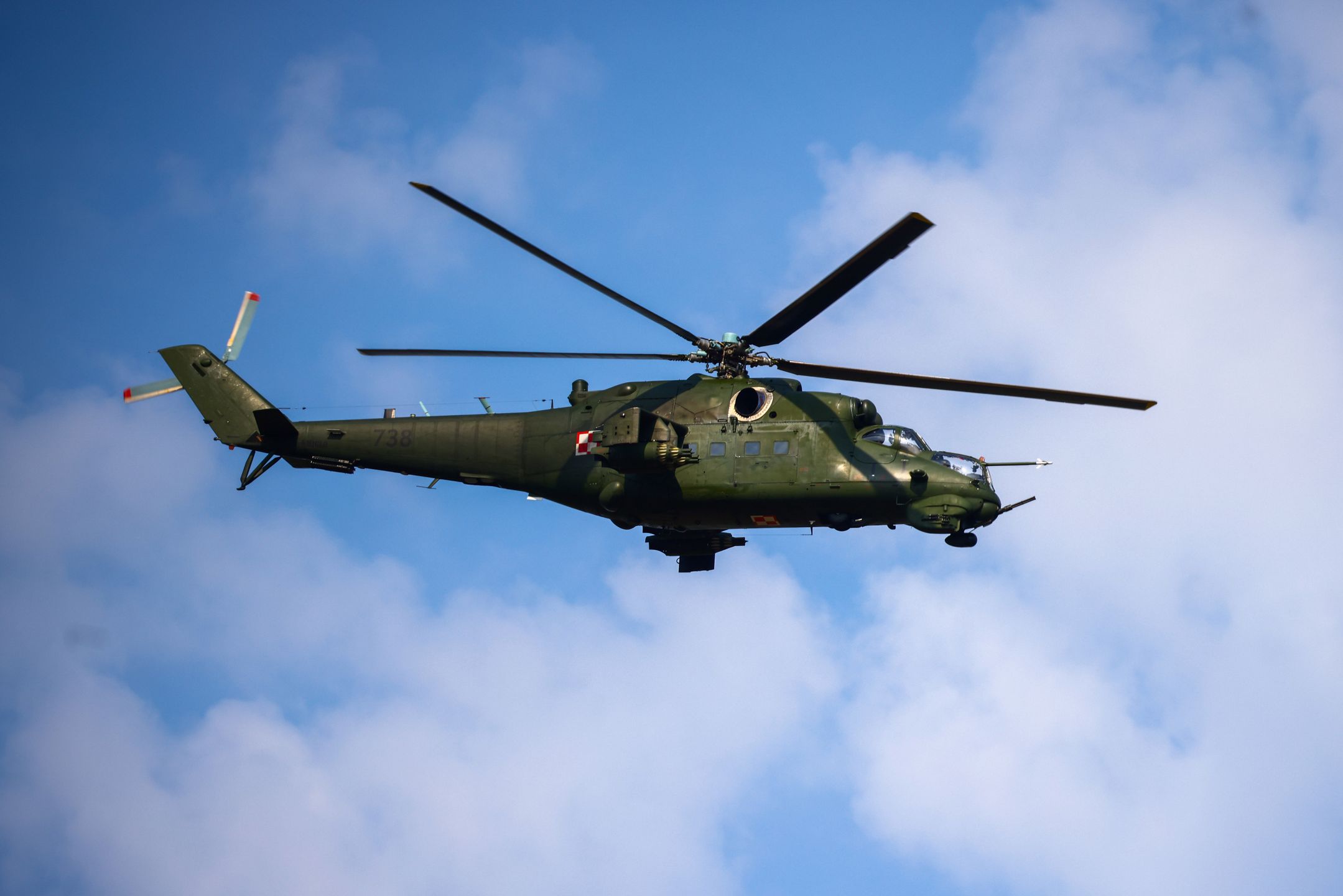 The Mil Mi-24 helicopter flying during a military parade on Polish Armed Forces Day in Warsaw, Poland on 15th August, 2024. Every year on 15 August Poland commemorates the Battle of Warsaw, also known as the Miracle on the Vistula. In 1920, the Polish army stopped Soviet troops, preventing their aggression against Europe. (Photo by Beata Zawrzel/NurPhoto via Getty Images)