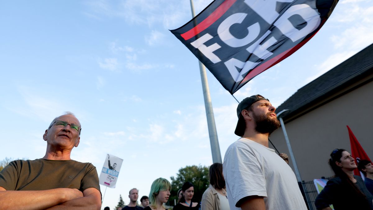 POTSDAM, GERMANY - SEPTEMBER 22:  Protesters gather outside the venue where members of the far-right Alternative for Germany (AfD) were holding their election evening party in Brandenburg state elections on September 22, 2024 near Potsdam, Germany. The AfD entered the election today in a neck-and-neck race against the incumbent German Social Democrats (SPD).(Photo by Michele Tantussi/Getty Images)