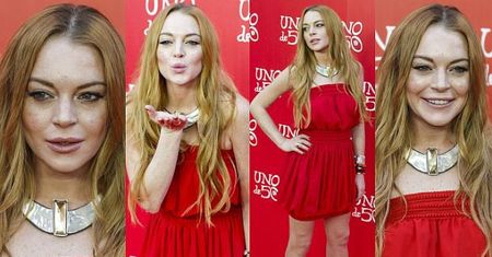Opuchnięta Lindsay Lohan "rozdaje buziaki" w Madrycie (ZDJĘCIA)