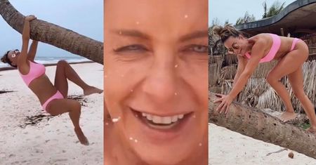 Nieugięta Małgorzata Rozenek wdrapuje się na palmę w różowiutkim bikini! Zwinna niczym małpka? (ZDJĘCIA)