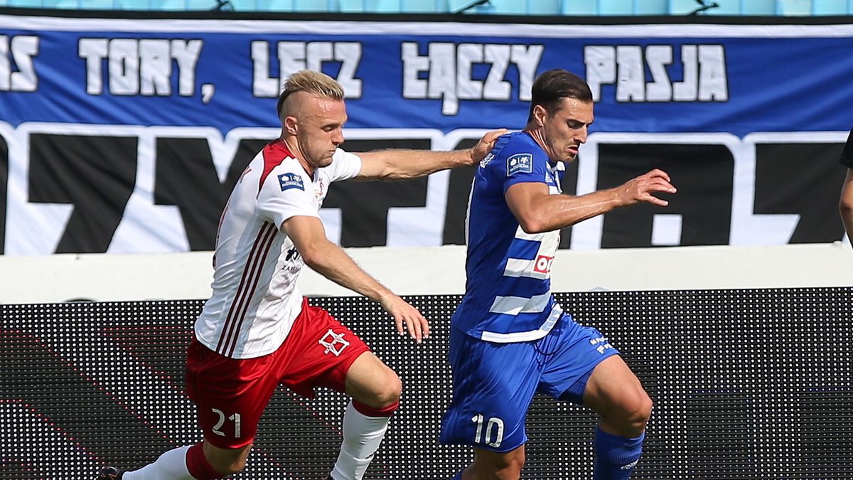 PAP / Piotr Augustyniak  / Na zdjęciu: Giorgi Merebaszwili (z prawej) w walce z Janem Grzesikiem (z lewej)