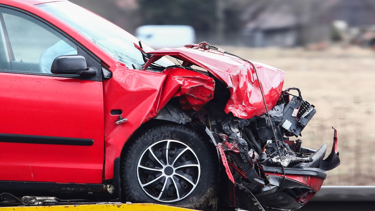 Economy And Daily Life In PolandA damaged car is seen on a car transporter driving a road in Krakow Poland on February 7, 2022. (Photo by Jakub Porzycki/NurPhoto via Getty Images)NurPhotoeuropean, cars, after, crashed, mask, transporter, smash, smashed, break, broke, auto, automotive, destroy, destroyed, accident, damage, damages, derbis
