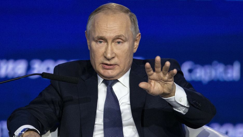 Temporary
Russian President Vladimir Putin gestures while answering to a question during an annual VTB Capital "Russia Calling!" Investment Forum in Moscow, Russia, Wednesday, Nov. 20, 2019. Putin warned Ukraine against trying to revise the 2015 Minsk agreement for eastern Ukraine. (AP Photo/Alexander Zemlianichenko, Pool)
AP POOL