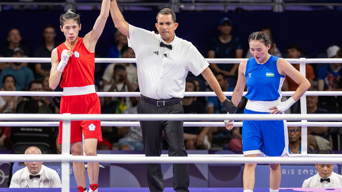 PARIS, FRANCE - AUGUST 2: Lin Yu-ting (red) of Taiwan (TPE), competes against Sitora Turdibekova (blue) of Uzbekistan during the Women's 57kg preliminary round 16 match on the seventh day of the Olympic Games Paris 2024 at South Paris Arena on August 2, 2024 in Paris, France. (Photo by Aytac Unal/Anadolu via Getty Images)