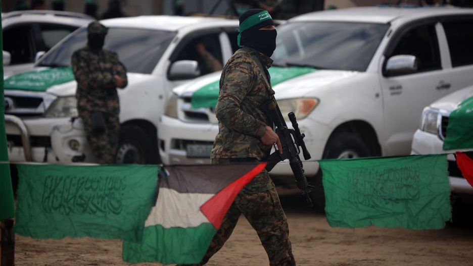 Three More Israeli Hostages Released As Part Of Ceasefire Deal
Hamas fighters stand in formation as Palestinians gather on a street to watch the handover of three Israeli hostages to a Red Cross team in Deir el-Balah, central Gaza, on February 8, 2025. Hamas militants hand over three Israeli hostages on February 8, as part of the fifth exchange under a fragile Gaza ceasefire, with 183 prisoners held by Israel due to be released later in the day. (Photo by Majdi Fathi/NurPhoto via Getty Images)
NurPhoto
ceasefire agreement, palestinians, deir el-balah, red cross team, february 8, team, gaza, released, gathering, militants, handover, majdi fathi, hostages, general news, photo., fifth exchange, ceasefire deal, handover event, exchange, hostage release, central gaza, hamas, nurphoto, prisoner swap, prisoners release, prisoners, gaza war 2025, fighters, unrest conflict and wra, israeli hostages, formation, fragile ceasefire, hostage exchange